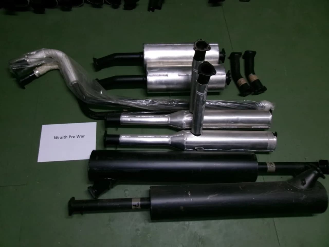 1x Front pipe & expansion box, 1x Front silencer, 1x Rear silencer, and 1x Tail pipe