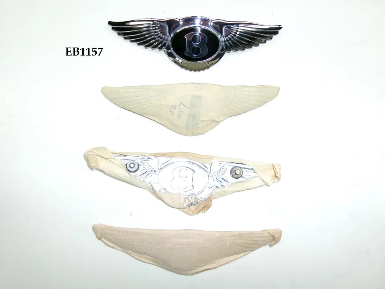 2x EB1157 / KE020 radiator shroud badge